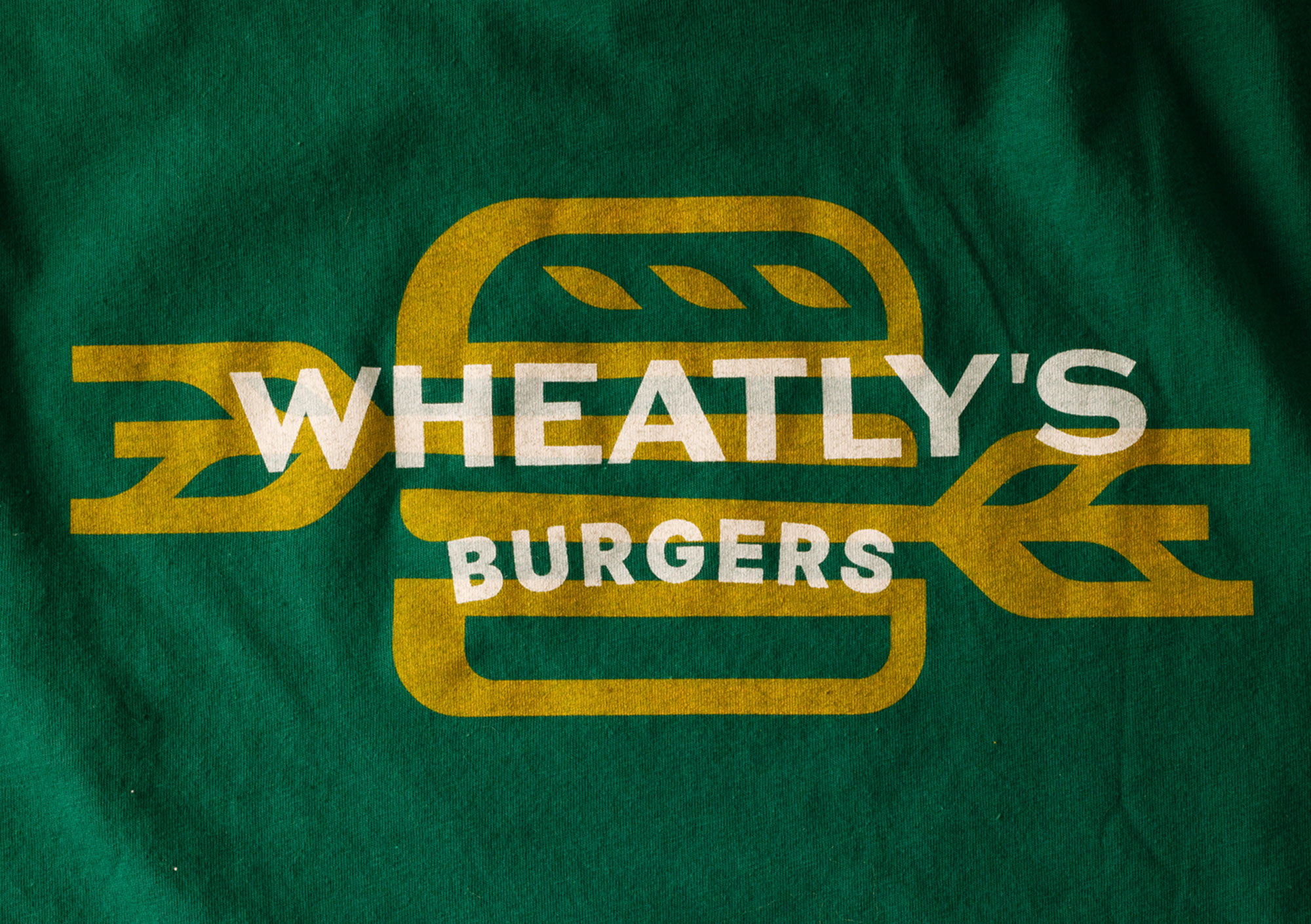 Whealty's burgers logo